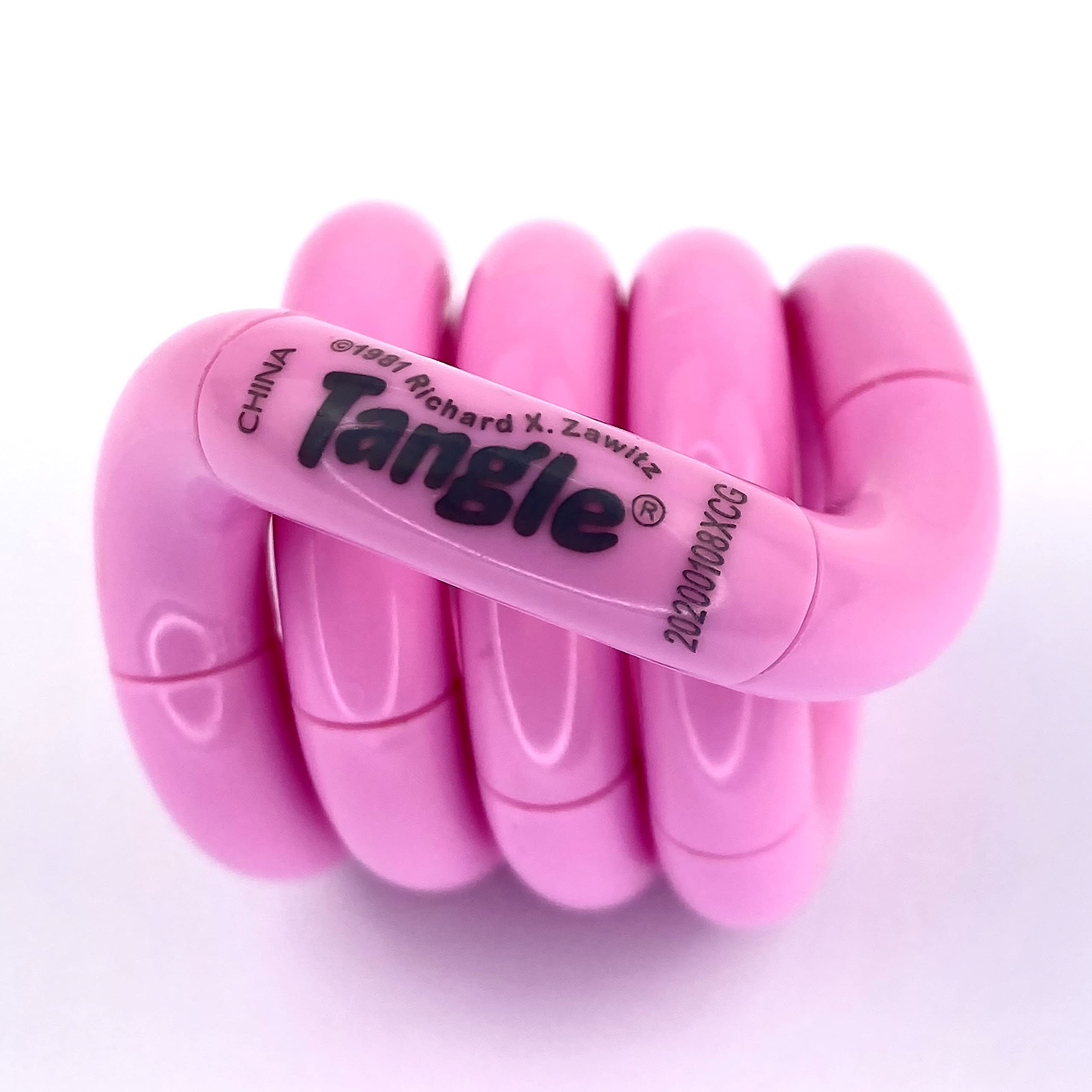 Tangle Jr. Solid Pink - Genuine Fidget - Fidget Toy for Kids and Adults — image 1