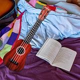 PLUSHCEWT Kids 42cm Guitar Ukulele 4 Adjustable Strings Music Education Toy Red view 3