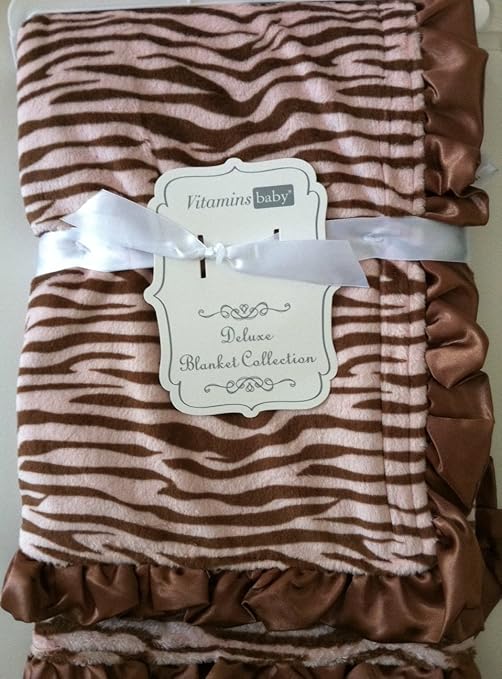 zebra blanket with pink trim