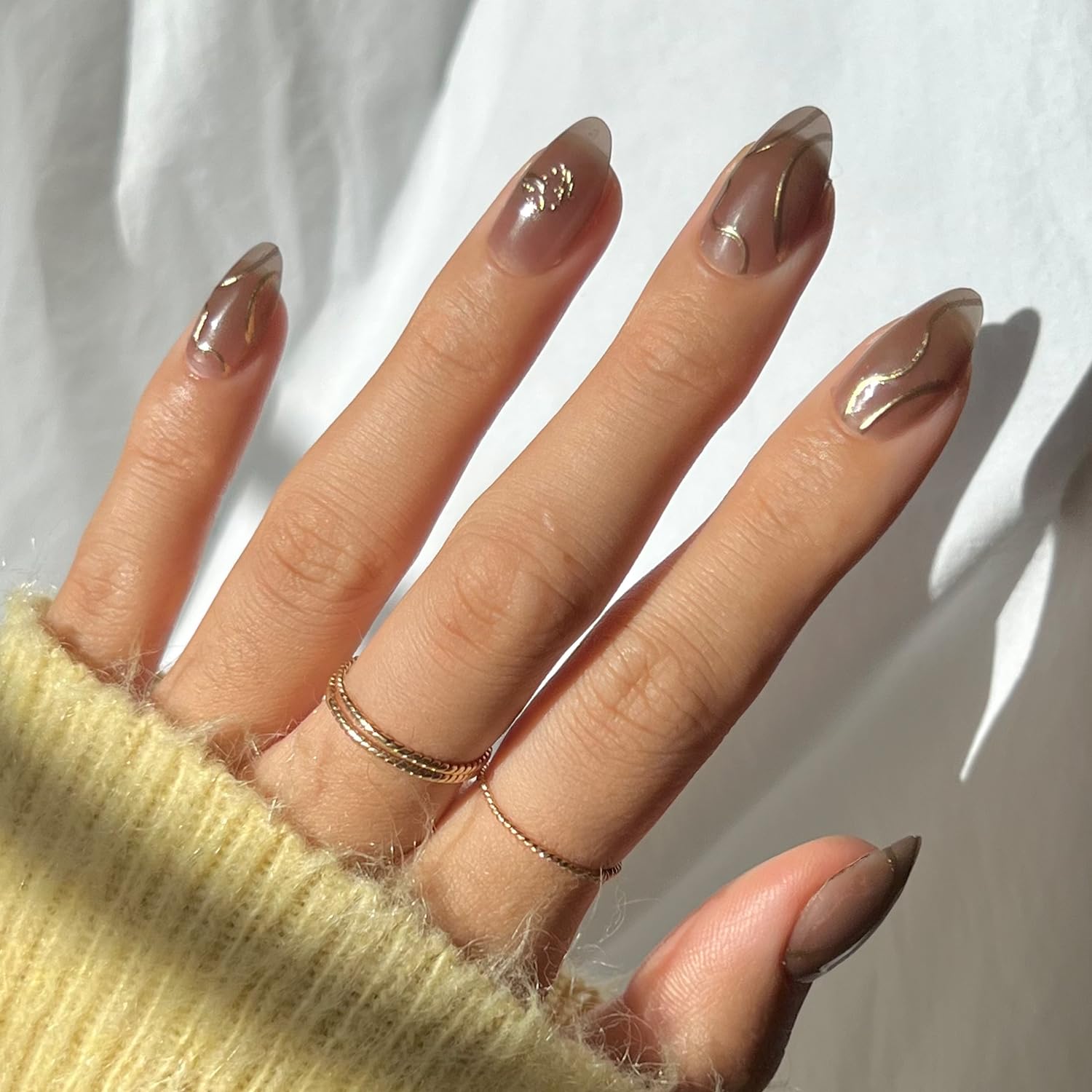 Photo 1 of Harry Potter™ x Glamnetic Press On Nails - Golden Cup™ | Semi-Transparent Brown 3D Gold Graphic Short Almond Nails in a Chrome & Glossy Finish | 15 Sizes - 30 Nail Kit with Glue