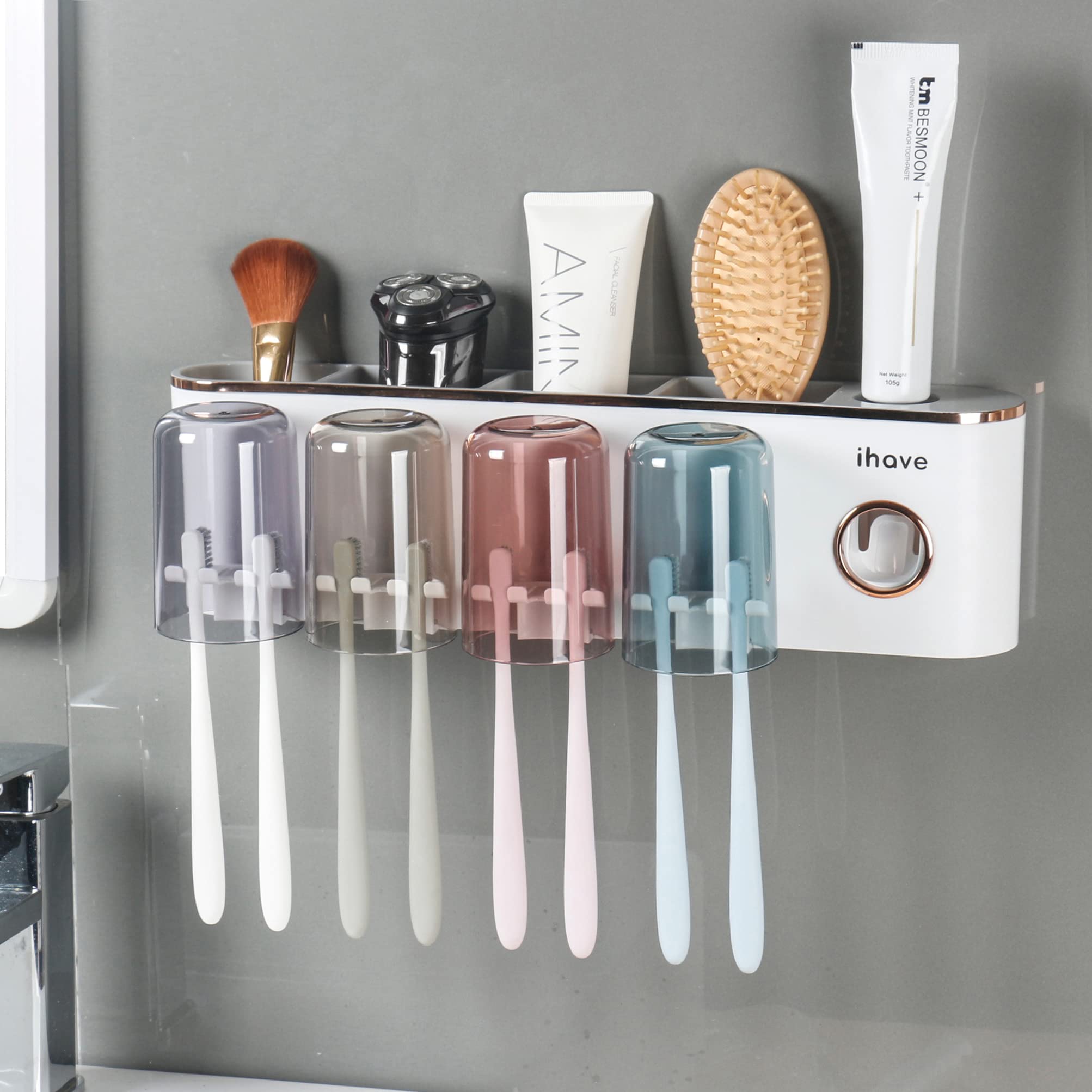Photo 1 of iHave Toothbrush Holders Bathroom Accessories with Toothpaste Dispenser, 4 Cups Toothbrush Holder Wall Mounted Bathroom Decor
