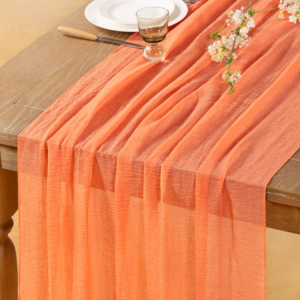 Photo 1 of DeZerlor Orange Cheesecloth Table Runner 2 Pack Fall Thanksgiving Table Runners 120 inches Boho Gauze Orange Cheese Cloths for Rustic Wedding Bridal Baby Shower Decor Party Fall Table Centerpiece