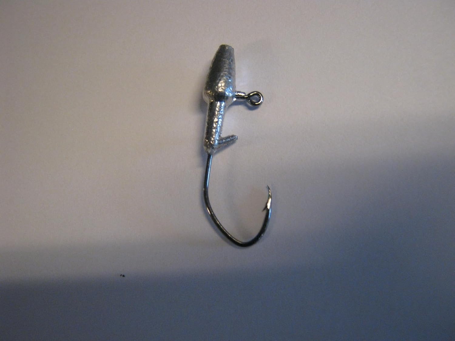 garrett outdoors Bullet jig Heads with black sickle hooks 100 count Sports & Outdoors