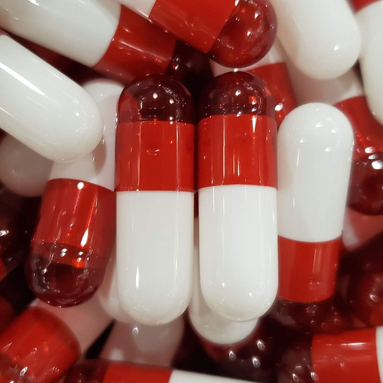 red and white capsule