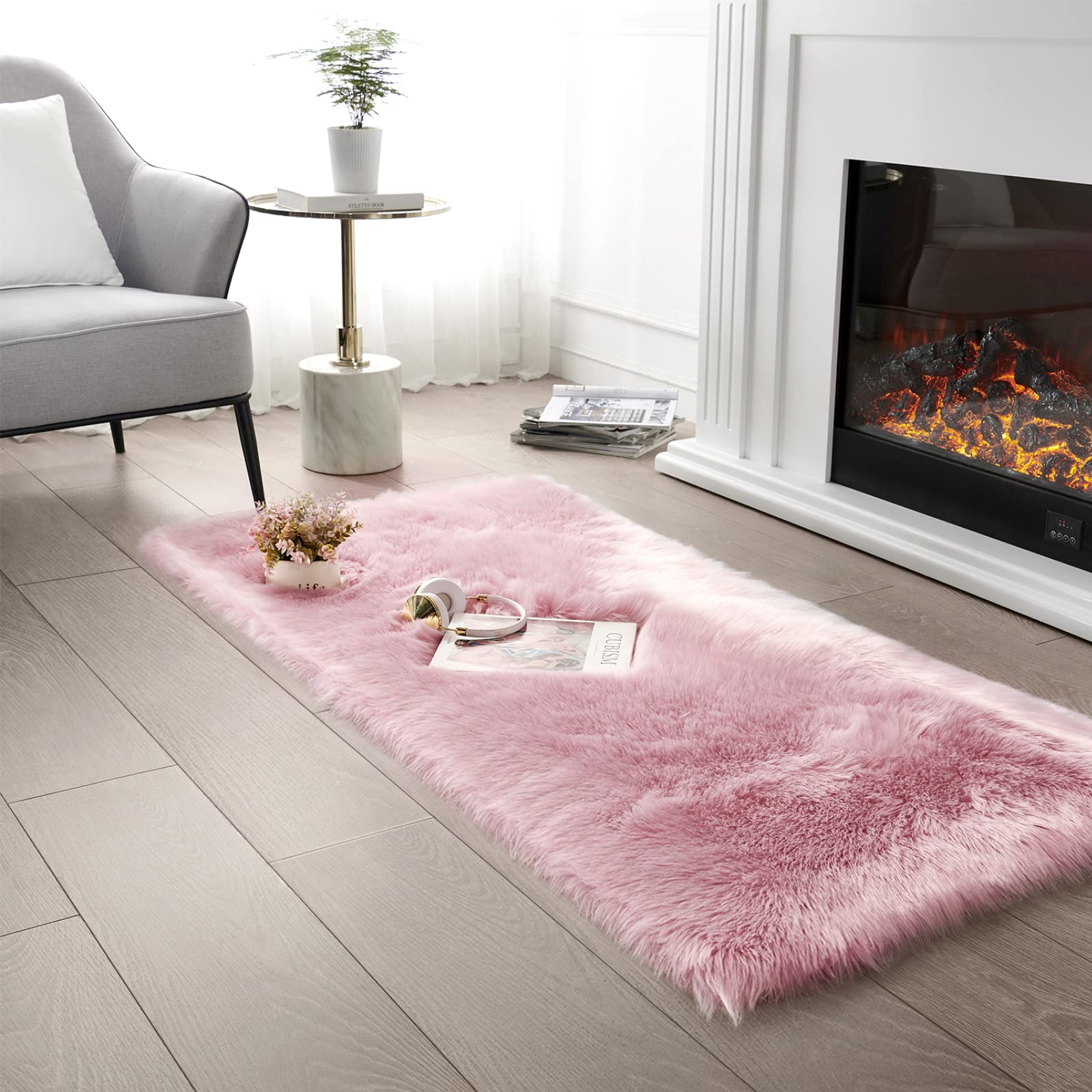 Photo 1 of SERISSA Soft Fluffy Rug Pink Faux Sheepskin Fur Rug Shaggy Area Rug for Bedroom Floor Living Room 3x5 Feet