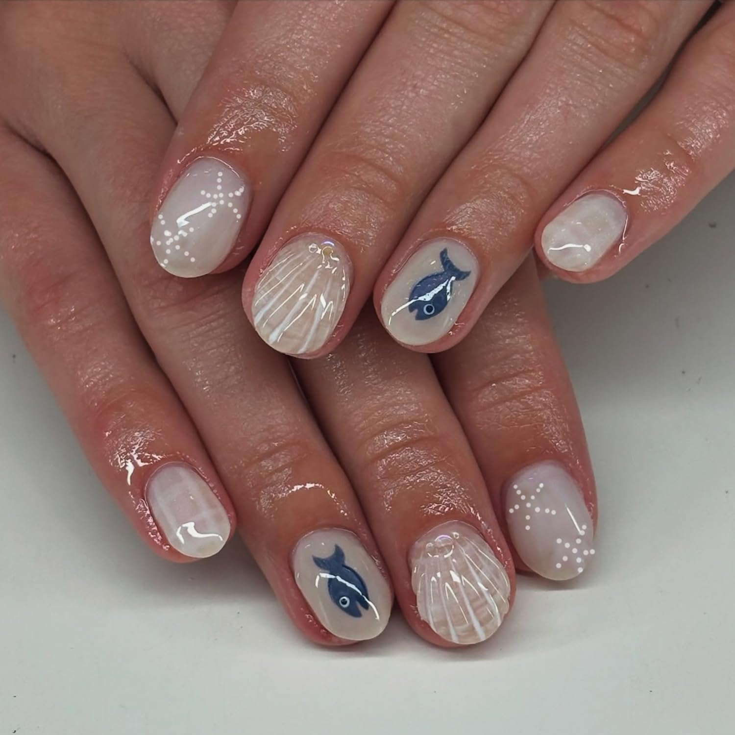 Photo 1 of 24 Pcs Short Square Press on Nails Summer Ocean Fake Nails with Shell Starfish and Fish Design Nude False Nails 3D Line Acrylic Nails Glossy Full Cover Stick on Nails Press ons Nails for Women
