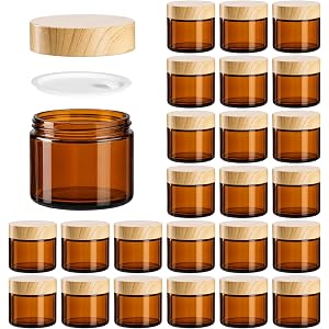 BPFY 24 Pack 2 oz Amber Glass cosmetic Jars with Woodgrain Lids for Lotion | Refillable Empty Containers For Creams, Body But