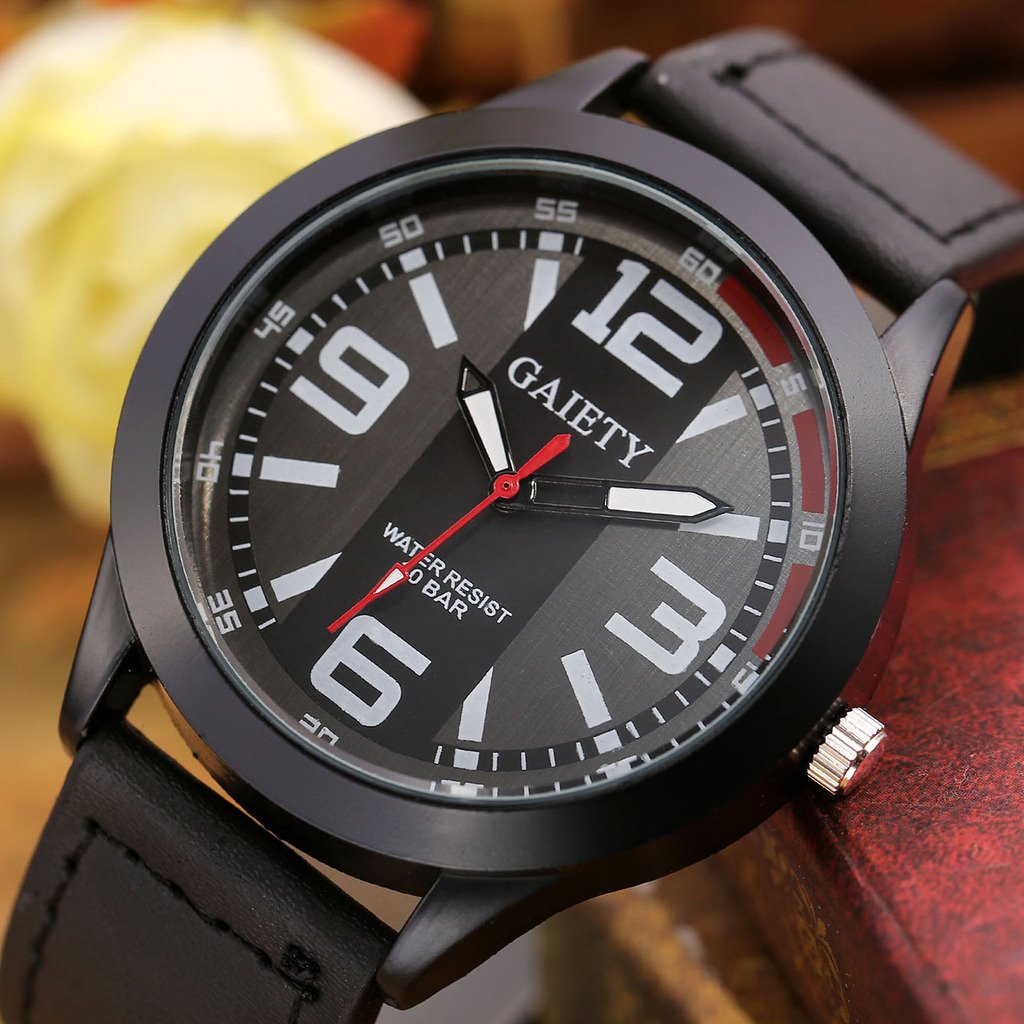 JSDDE Montre à Quartz Homme Bracelet PU Style Sportif Montre Bracelet Fil de Suture Montre Etanche Noir