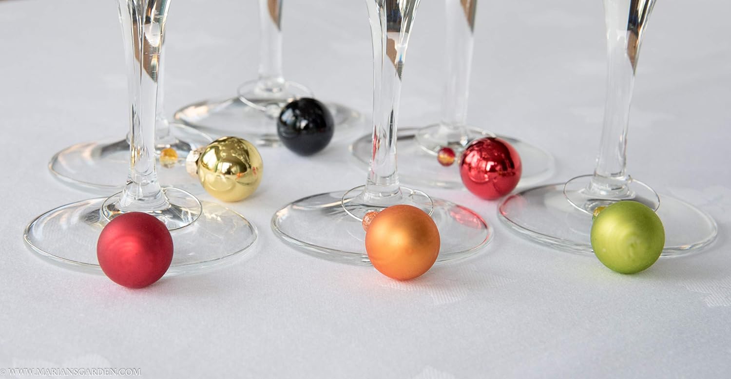 6 Christmas bauble wine glass charms in warm colours. Amazon.co.uk