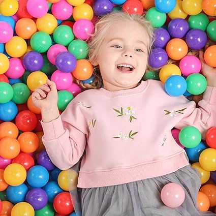 baby in ball pit