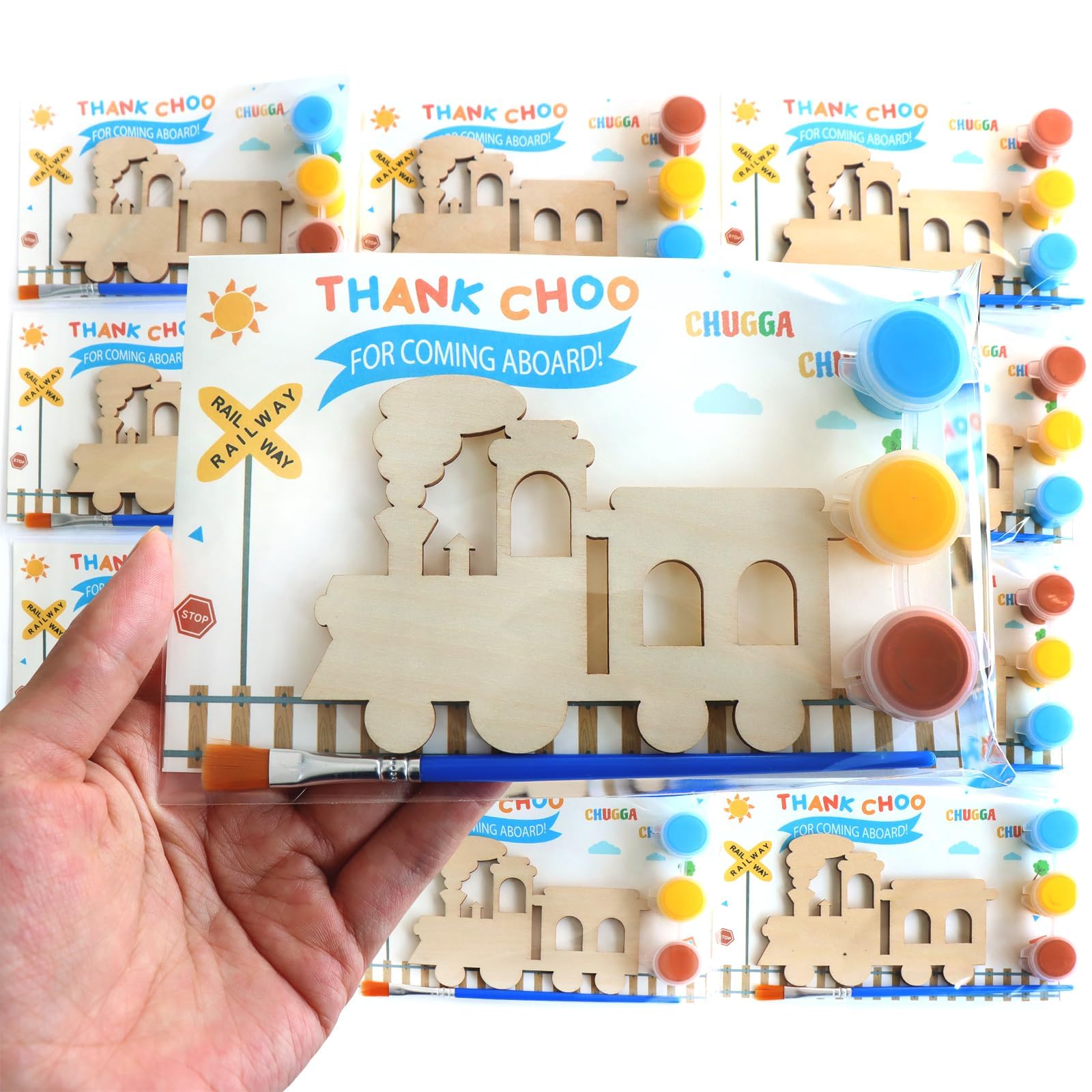 Photo 1 of 12 Pack Pre-Packaged Train Party Favors, Wooden Train Cutouts with Magnets & Painting Kits for Kids, Choo Choo Birthday Decorations & Thank You Gifts for Guests