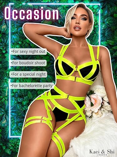 sexy erotic french lingerie Sexy blonde dominatrix in underwear holding whip in underwear at barn in  red light Stock Photo