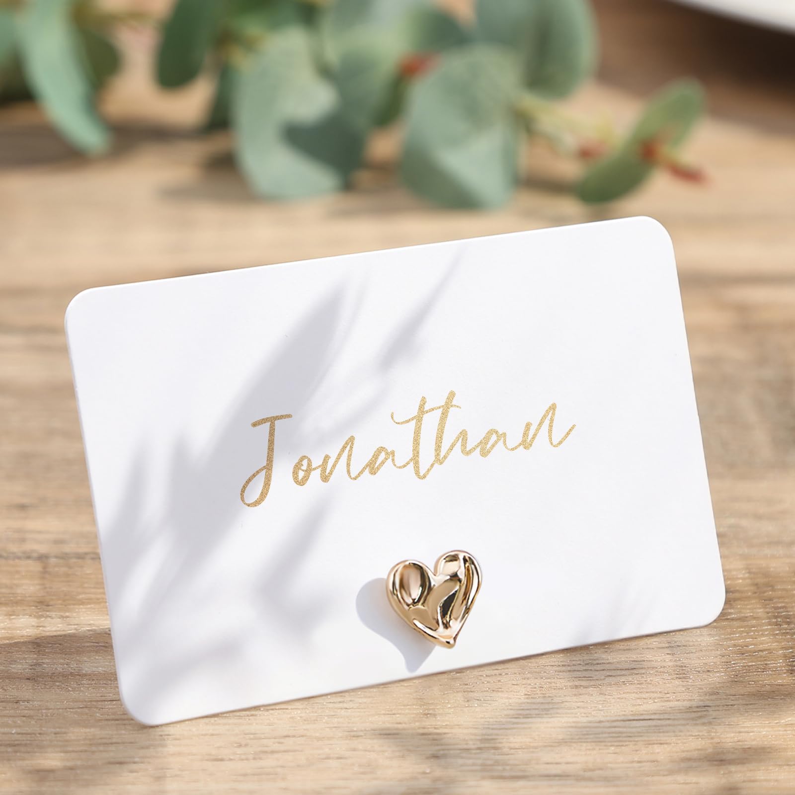 Photo 1 of UNIQOOO 12Pcs Decorative Gold Love Heart Place Card Holders Bulk, Romantic Name Card Stands Set, for Wedding Engagement Decor, Table Setting, Business Card, Name Tag, Party Food Labels
