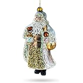 Glittered Santa Holding a Magical Lantern Blown Glass Christmas Ornament