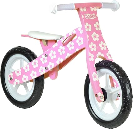 pink wooden balance bike