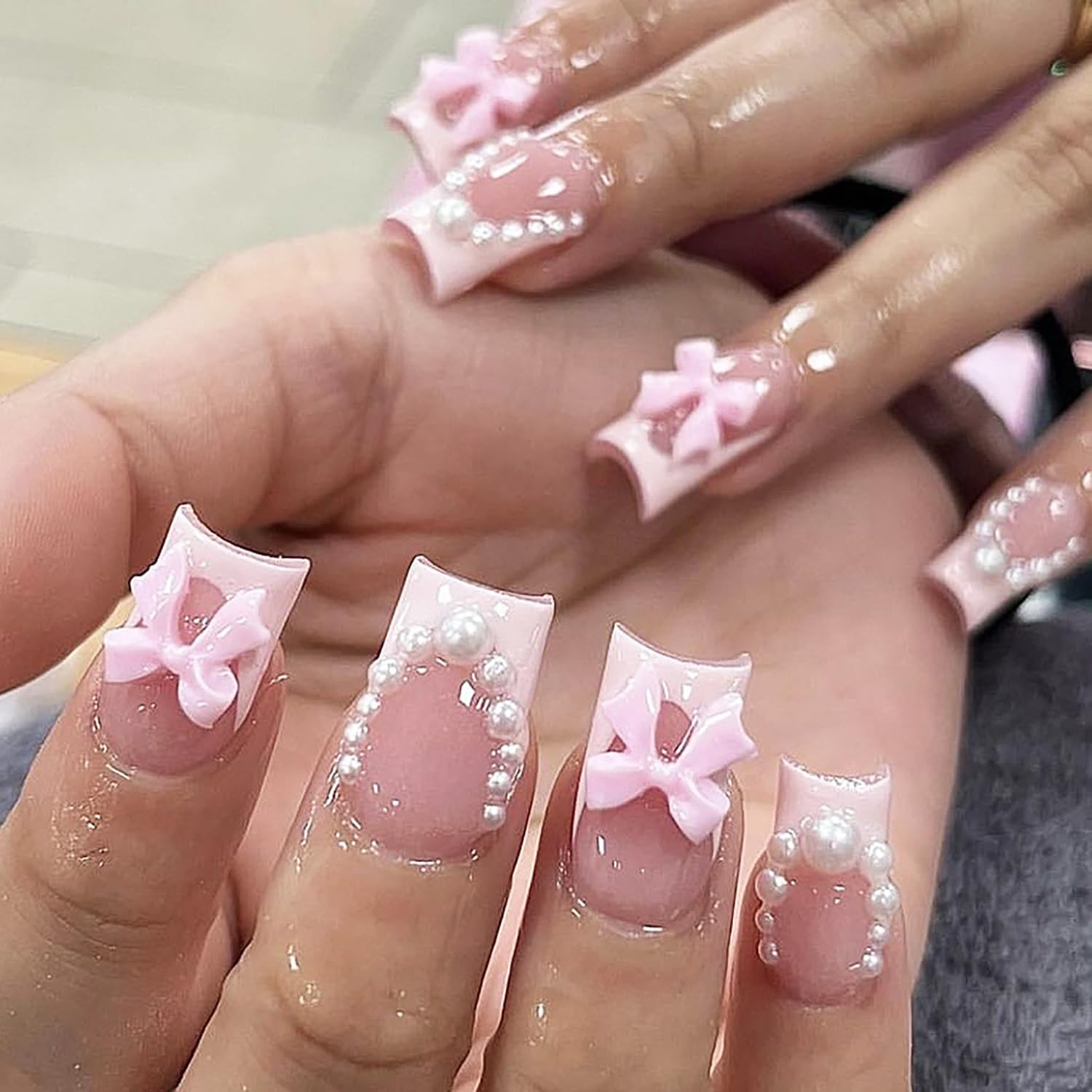 Photo 1 of 24 Pcs Pink Square Press on Nails Short Medium Fake Nails Cute Pearl Bow Nails Reusable False Nails Kit French Tip Acrylic Nails Press ons Artificial Nails Holiday Full Cover Stick on Nails for Women