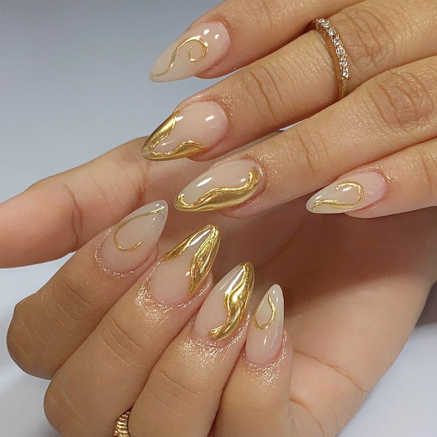 Photo 1 of Almond Shaped Press on Nails Short Chrome Gold Fake Nails with Designs French Tip Acrylic Nails Micro Carved Gold Line Full Cover Artificial Stick on Nails Glossy Glue on Nails for Women Girls 24 Pcs