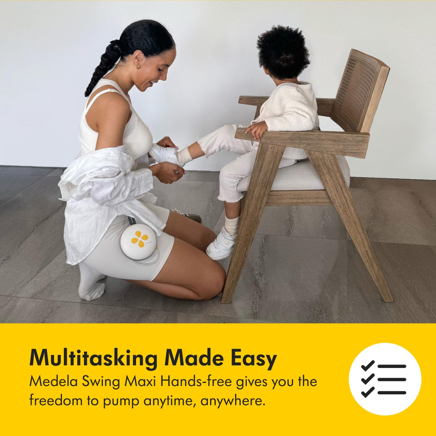 Medela Swing Maxi Hands-Free Double Electric Breast Pump, Easy and Intuitive Design for On-The-Go, Compatible with Medela Family App