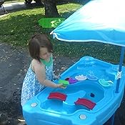 step2 cascading cove sand and water table with cover and umbrella