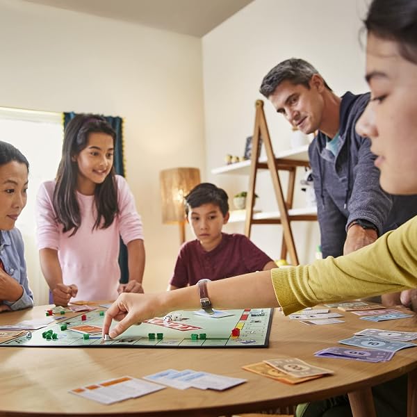 MONOPOLY GAME, FAMILY BOARD GAMES FOR 2 TO 6 PLAYERS & KIDS AGES 8 AND UP, INCLUDES 8 TOKENS (TOKEN VOTE EDITION)