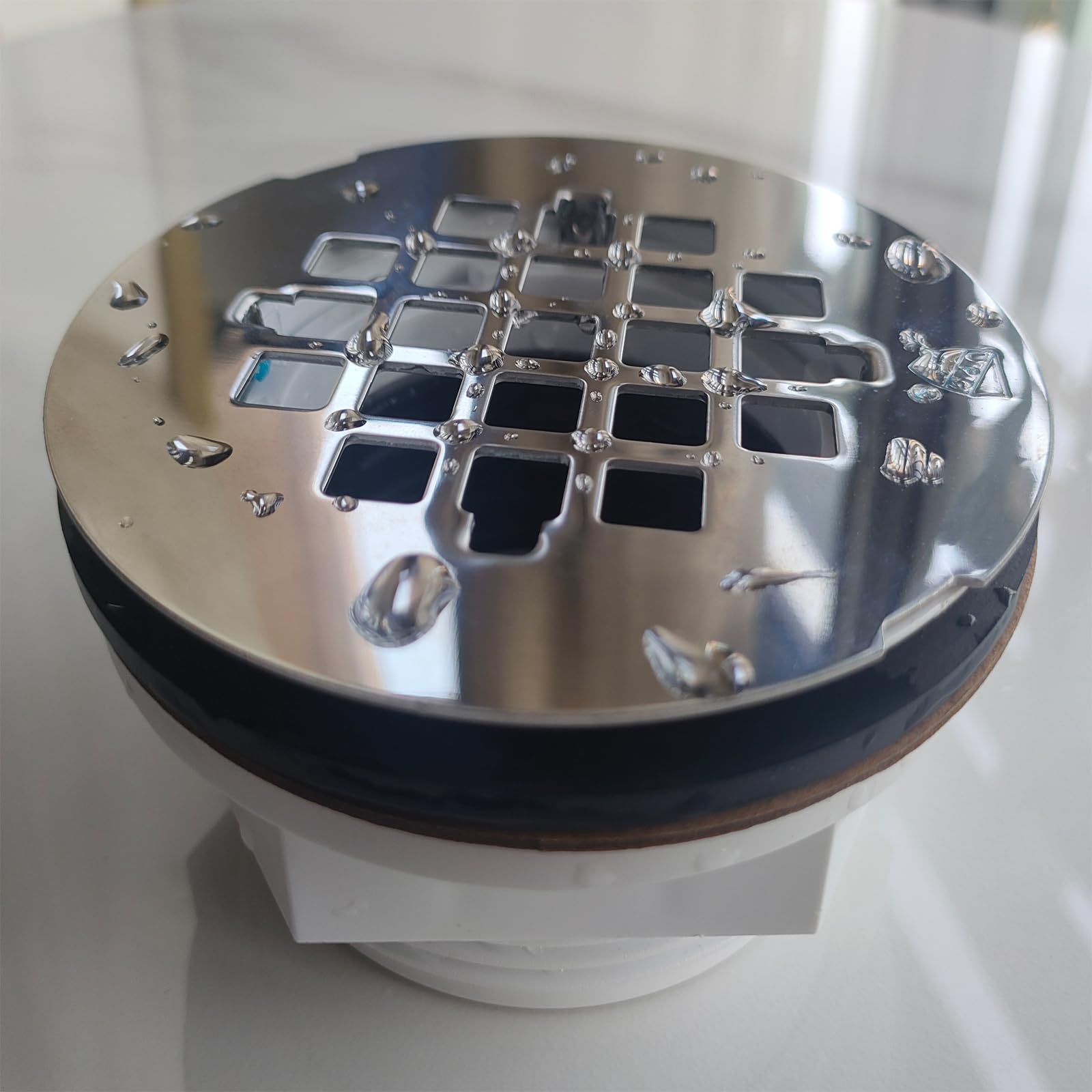 Photo 1 of (1 Pack) Yariwiz 2" No-Caulk Snap-in Round Floor Shower Drain for Shower Pan with 4-1/4" Stainless Steel Round Grid Cover
