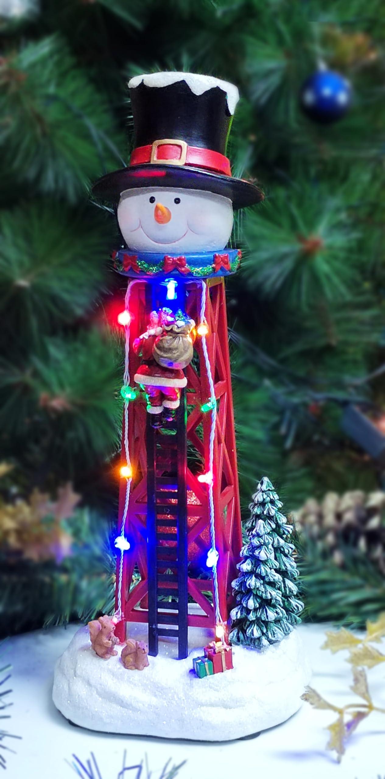 Photo 1 of ***MAY NOT BE FUNCTIONAL***
Moments in Time Christmas Snowman Water Tower 12.44”H LED Lights Hand-Painted Polyresin Santa Climbing Scene Battery Operated Christmas Village Decoration Winter Holiday Display
