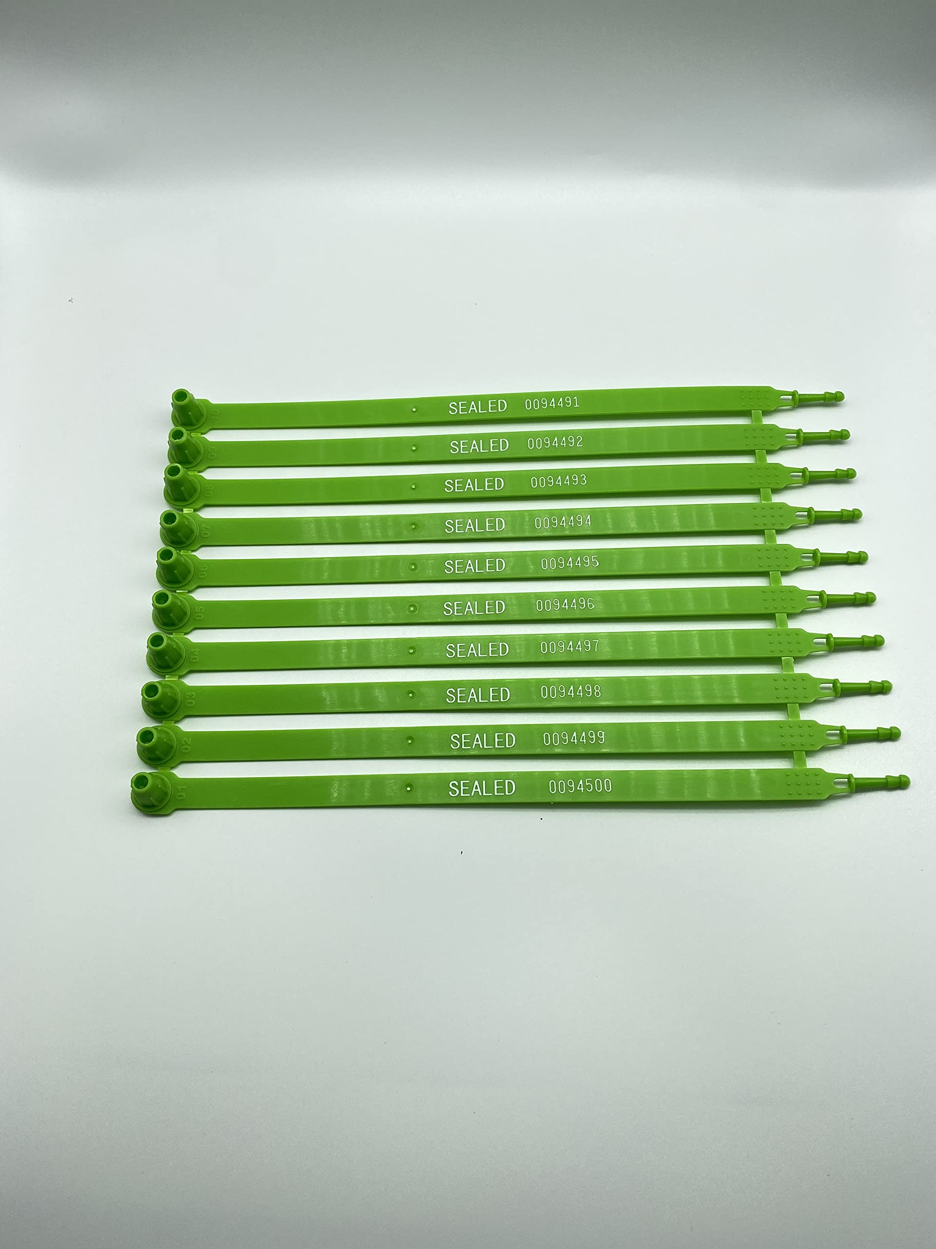 100 PCS Green Tite-Lock Plastic Tractor Truck Door Seal Tamper Evident Security Tags Numbered Safety Disposable Locks for Trailer Logistics Shipping Transport