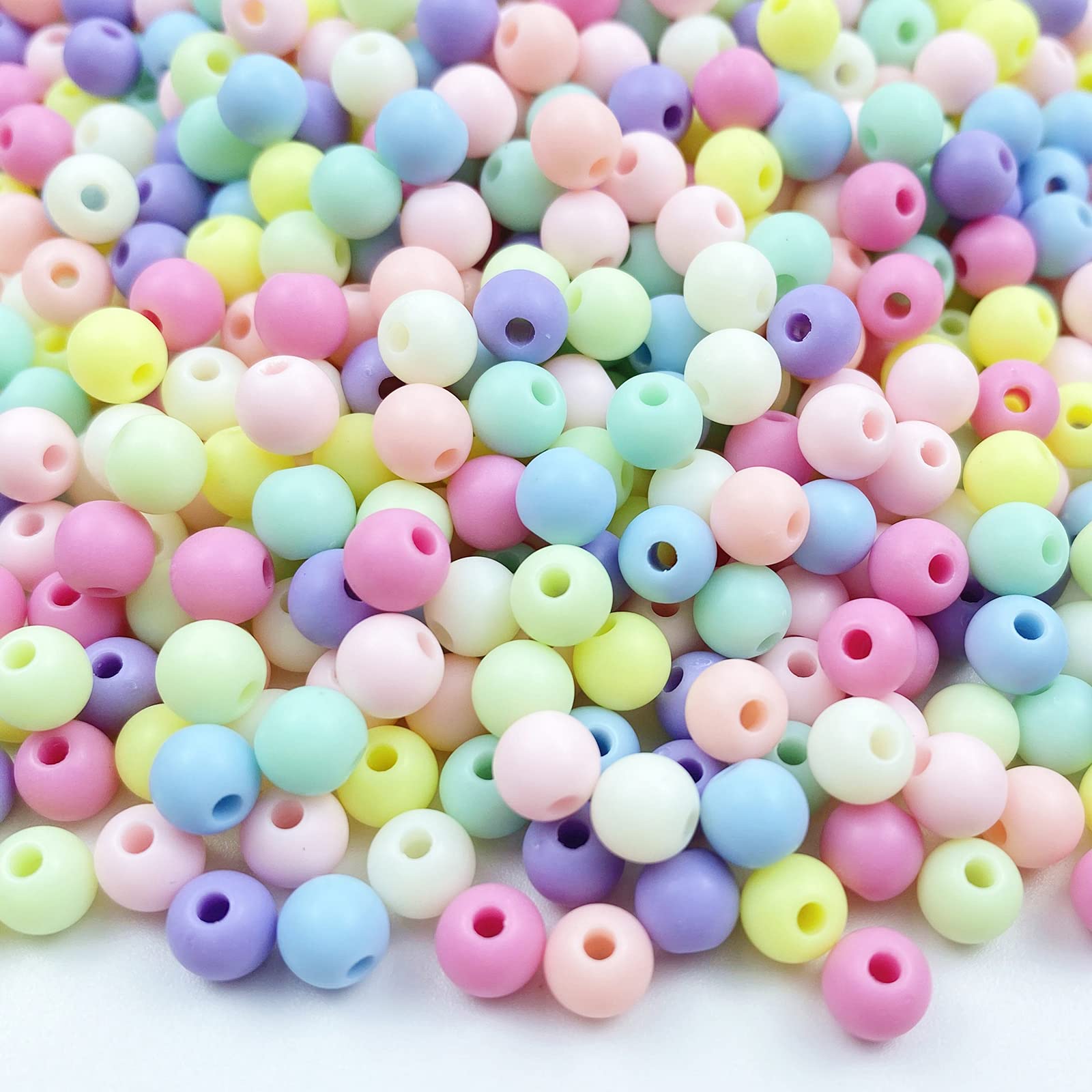 Photo 1 of Jmassyang 1000 Pieces 6mm Candy Color Acrylic Round Frosted Beads Assorted Candy Color Mix Plastic Pastel Matte Loose Spacer Mixed for Jewelry Making Bracelets Necklaces DIY Crafts (6mm)