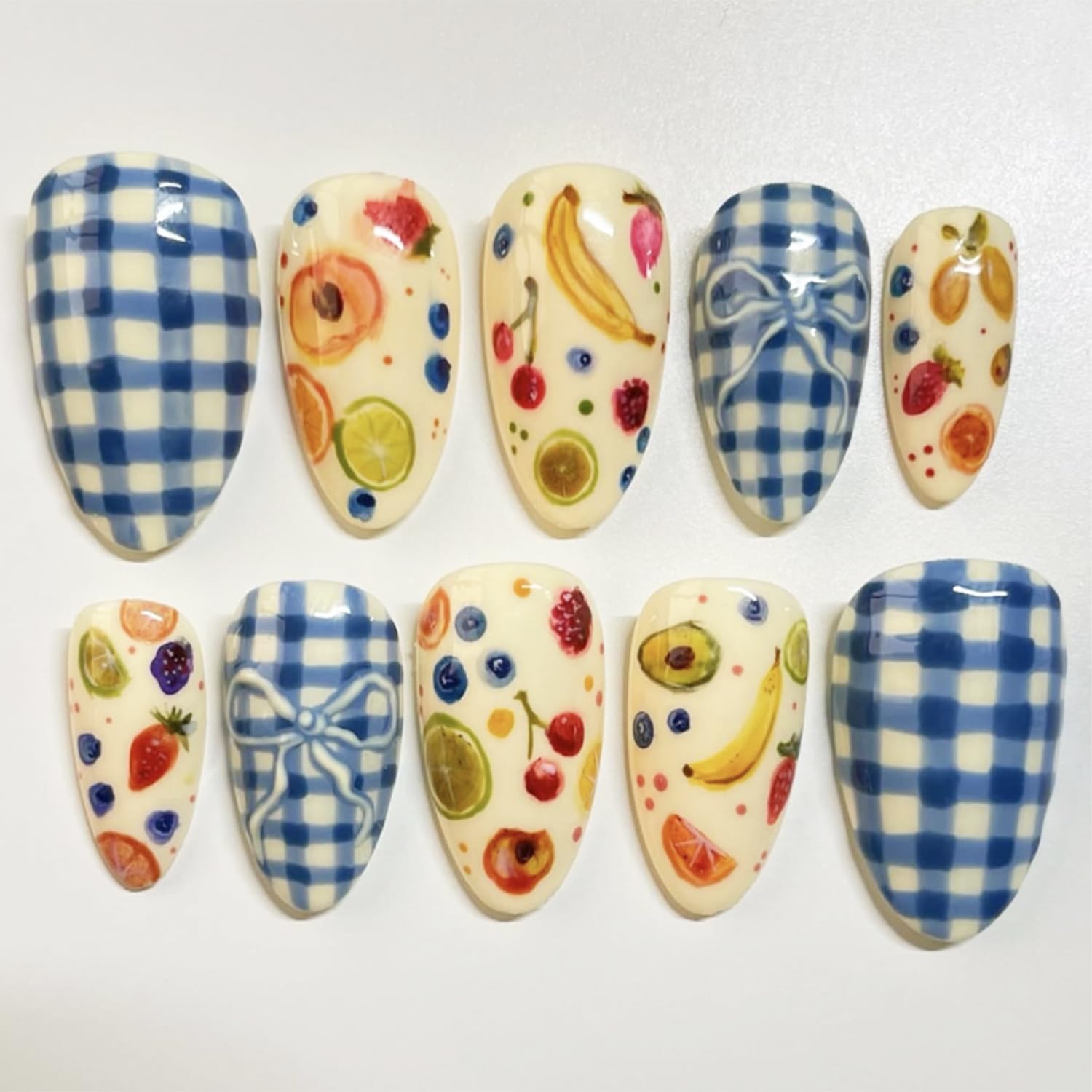 Photo 1 of 24pcs Fruit Press on Nails Medium Almond Fake Nails with Bow Lemon Banana Cherry Blueberry Strawberry Design Summer False Nails Kit Blue White Lattice Glue on Nails Full Cover Stick on Nails for Women