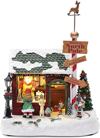 Immagini Babbo Natale In Movimento.Holyart Villaggio Natalizio Casa Babbo Natale Luminoso Musicale Movimento Nani 30x25x17 Cm Amazon It Casa E Cucina