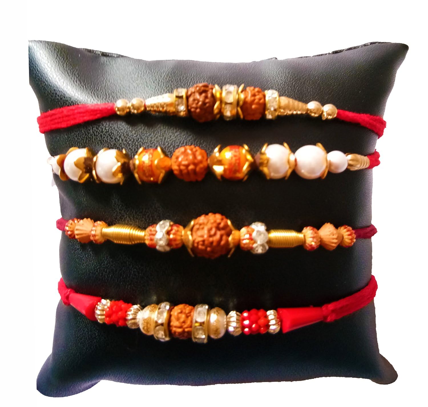 dms retail set of 4 different pattern rudraksh rakhi for brother with roli chawal