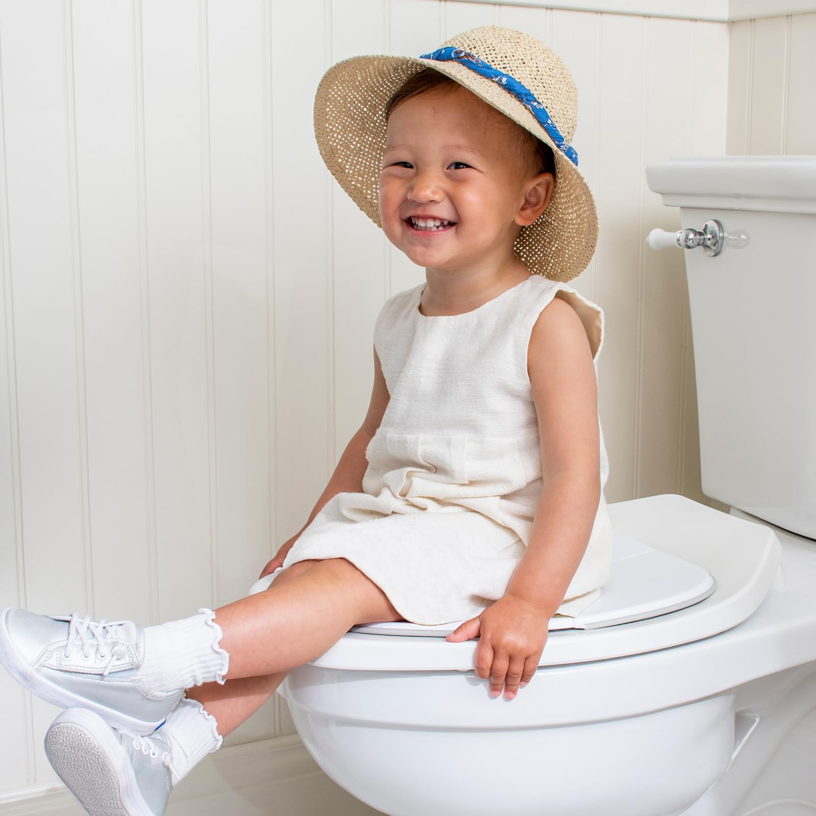 Travel Potty Seat, Ultra Compact, Ultra Non-Slip, Seat Made in USA, No-Pinch Locking Hinges, Easy to Clean, Included Carry Bag