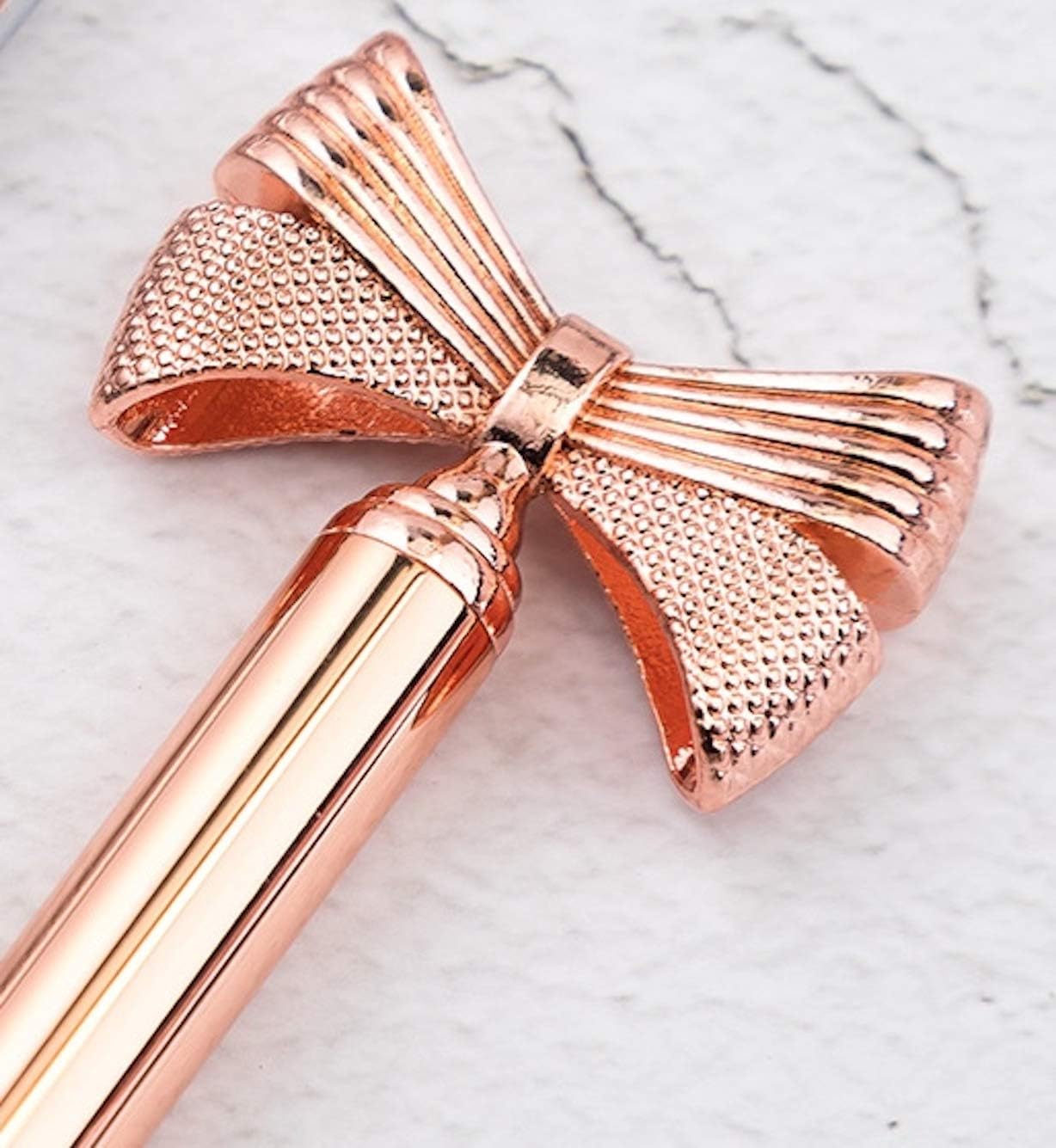 NEO+ Quality metal bow ballpoint pen in rose gold. Stylish design, pen refill and pen pouch included - Image 3