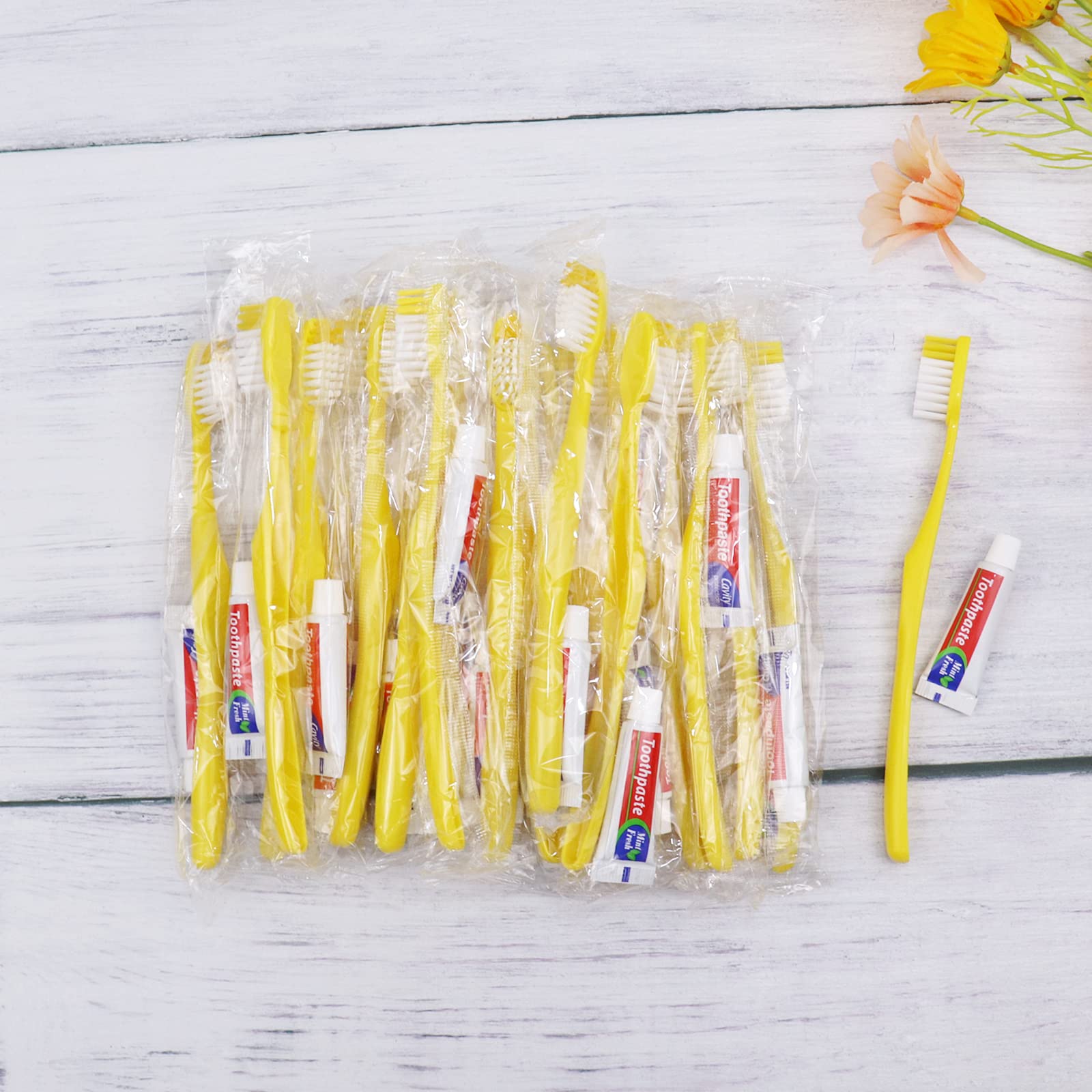 Disposable Toothbrush with Toothpaste Pack of 150,Yellow Hollow Hotel Toothbrush Set Individually Wrapped Manual Travel Toothbrush Kit for Adults,Kids,Hotel,Homeless,Nursing Home,Charity