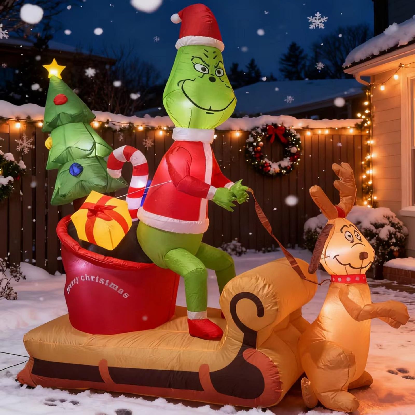 Photo 1 of 7 FT Green Monster Christmas Inflatable Decoration, Green Monster and Dog Max on The Sleigh Scene Decoration, Built-in 8 high-Light LED Lights, Interesting Outdoor Christmas Decoration. (Multicolor1)