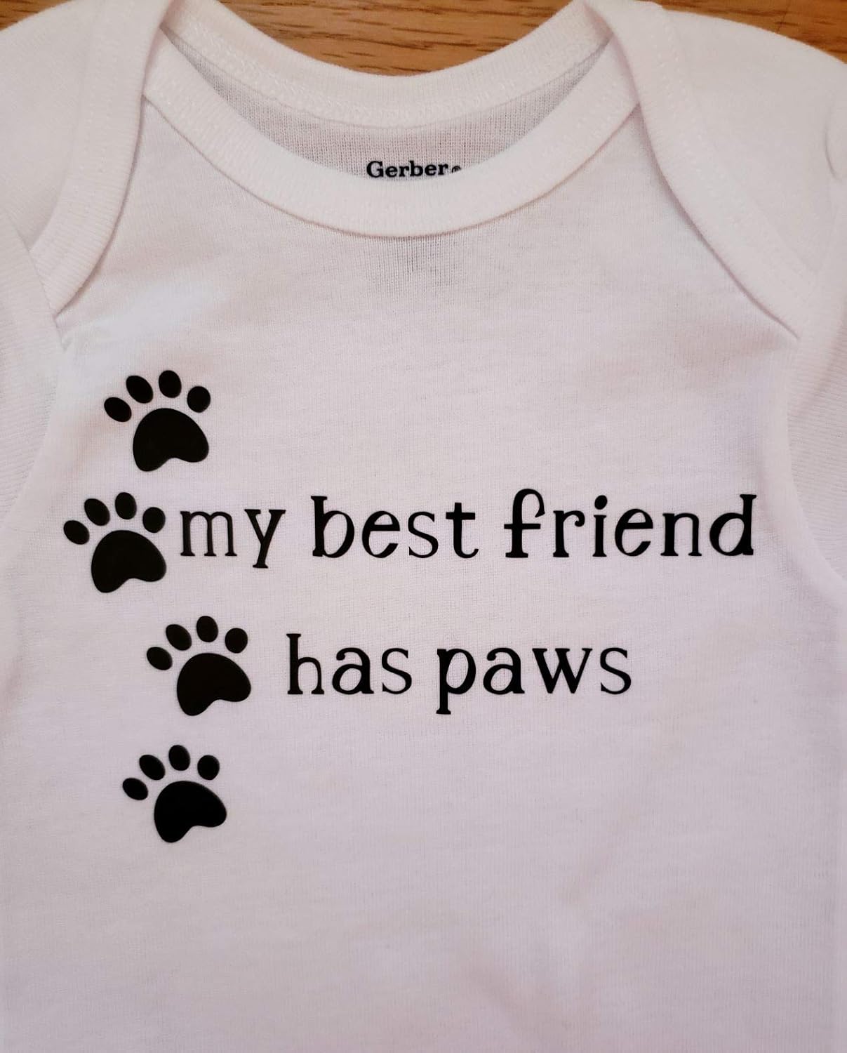 my best friend has paws onesie