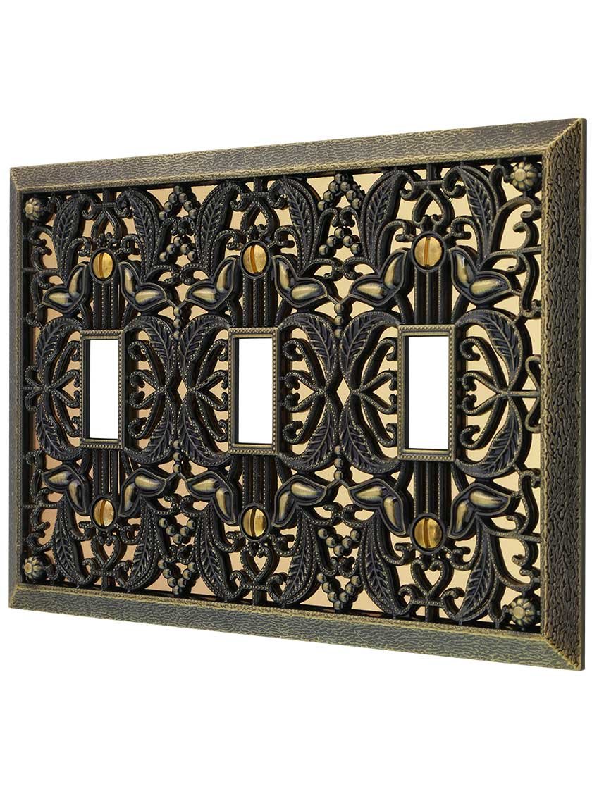Amerelle Filigree Triple Toggle Cast Metal Wallplate in Antique Brass