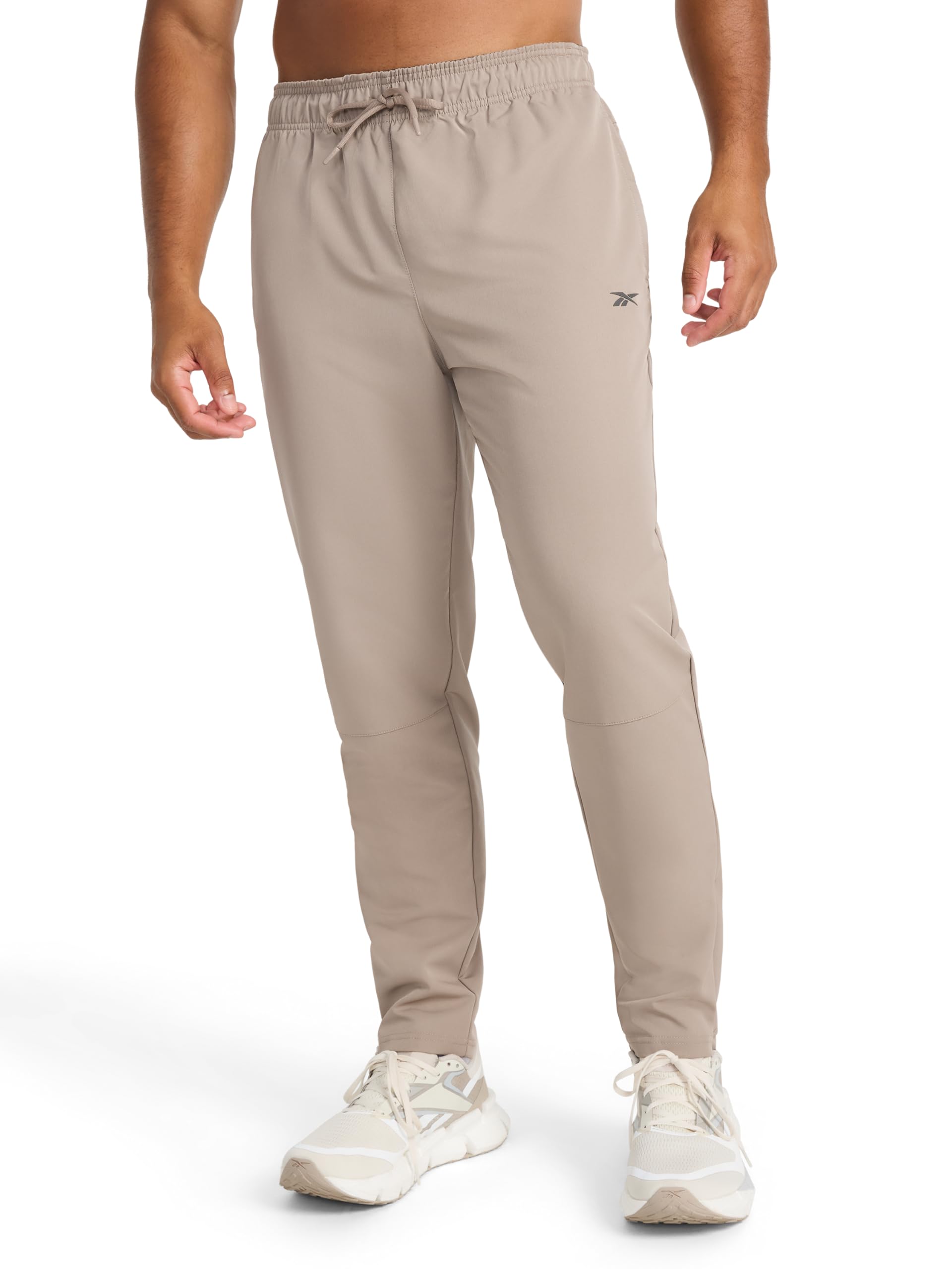 Reebok Men’s Dominator Pant, Standard Fit, 30” Inseam, Lightweight Stretch Poly Fabric, Driftwood, Small
