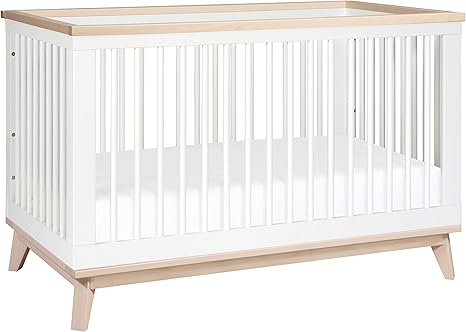 white washed baby crib