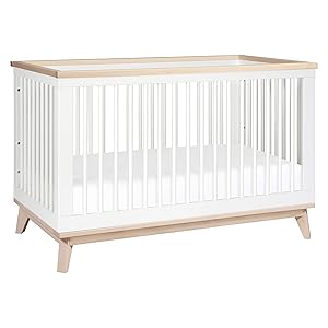 white and natural wood crib