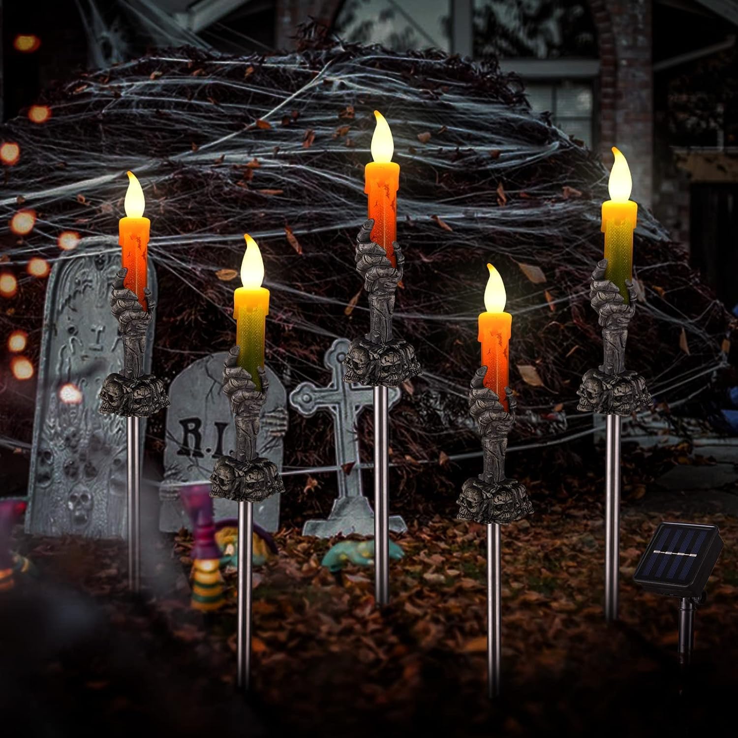 Photo 1 of Halloween Decorations Outdoor, 5 Pack Solar Pathway Lights, LED Skull Black Hand Candle Holder, Outdoor Party Home Garden Porch Decor Orange & Green Lights