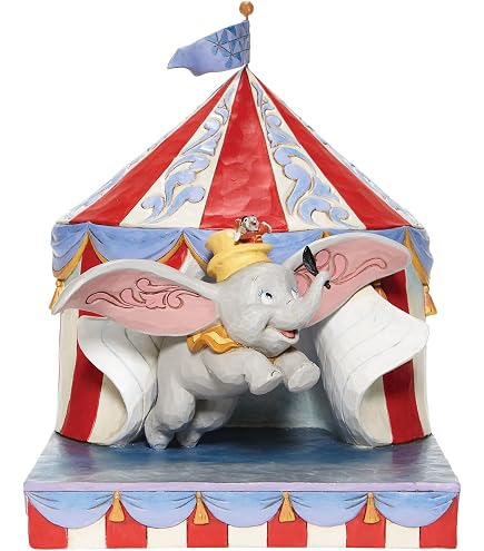 Amazon.com: Enesco Disney by Romero Britto Baby Dumbo Figurine