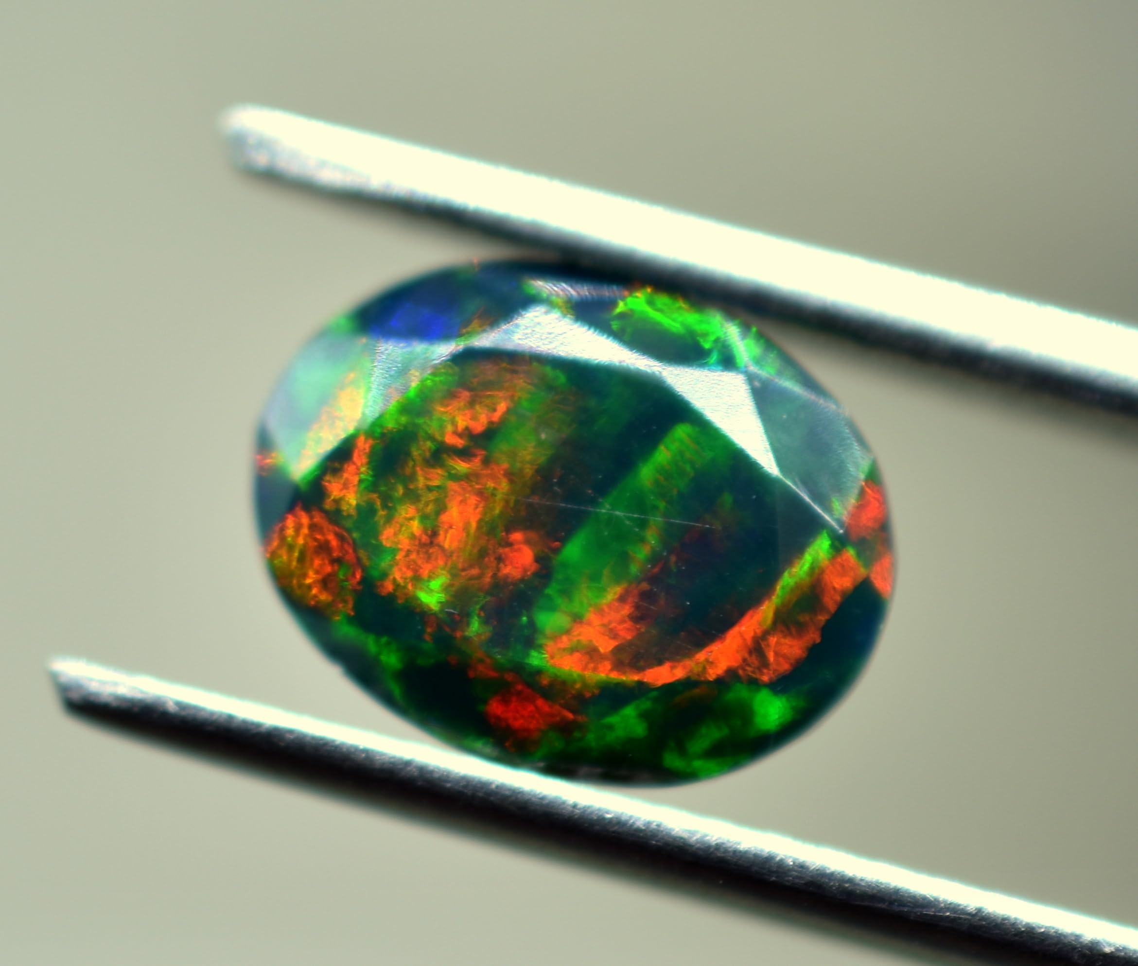 AAAA+ Certified Natural 8-10 mm Oval Shape Faceted Black Opal Gemstone Multi Fire Premium Smoked Welo Opal for Earrings Ring Necklace Jewelry Making Supplies Healing Crystals Loose Gemstones