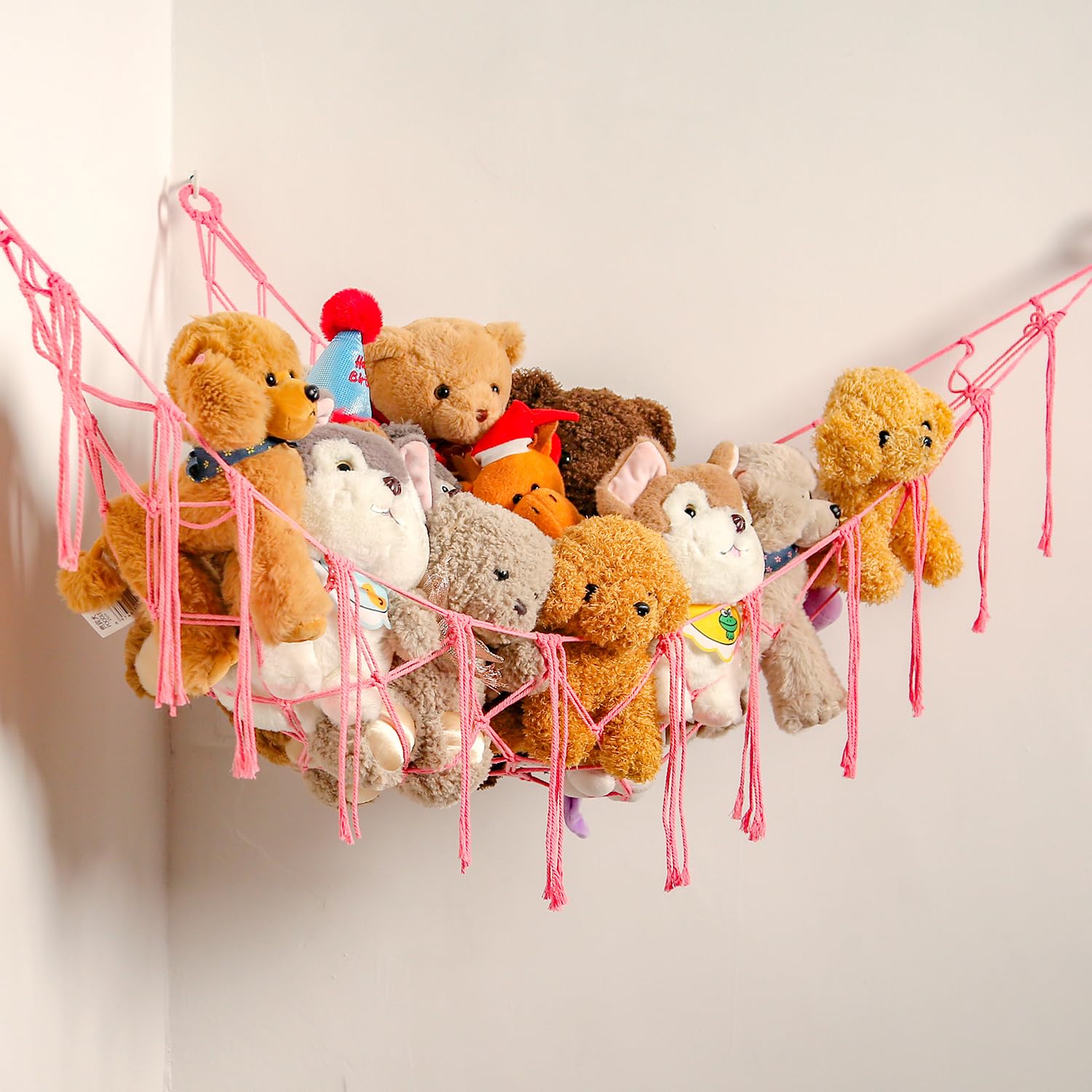 Photo 1 of YKBU Stuffed Animals Hammock Corner Hanging Net with Tassel Macrame Stuffed Animal Storage Plush Toy Holder Toy Organizer for Boho Nursery Playroom Bedroom Kids Room (pink, large)