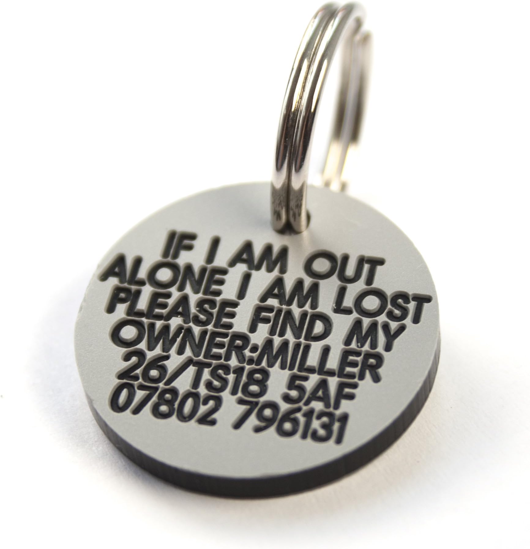 Engraving Studios Deeply engraved silver plastic 27mm circular dog tag