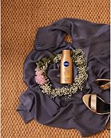 Nivea Q10 Firming Body Lotion Bronze 400g Skin Elasticity Tanned Look view 2