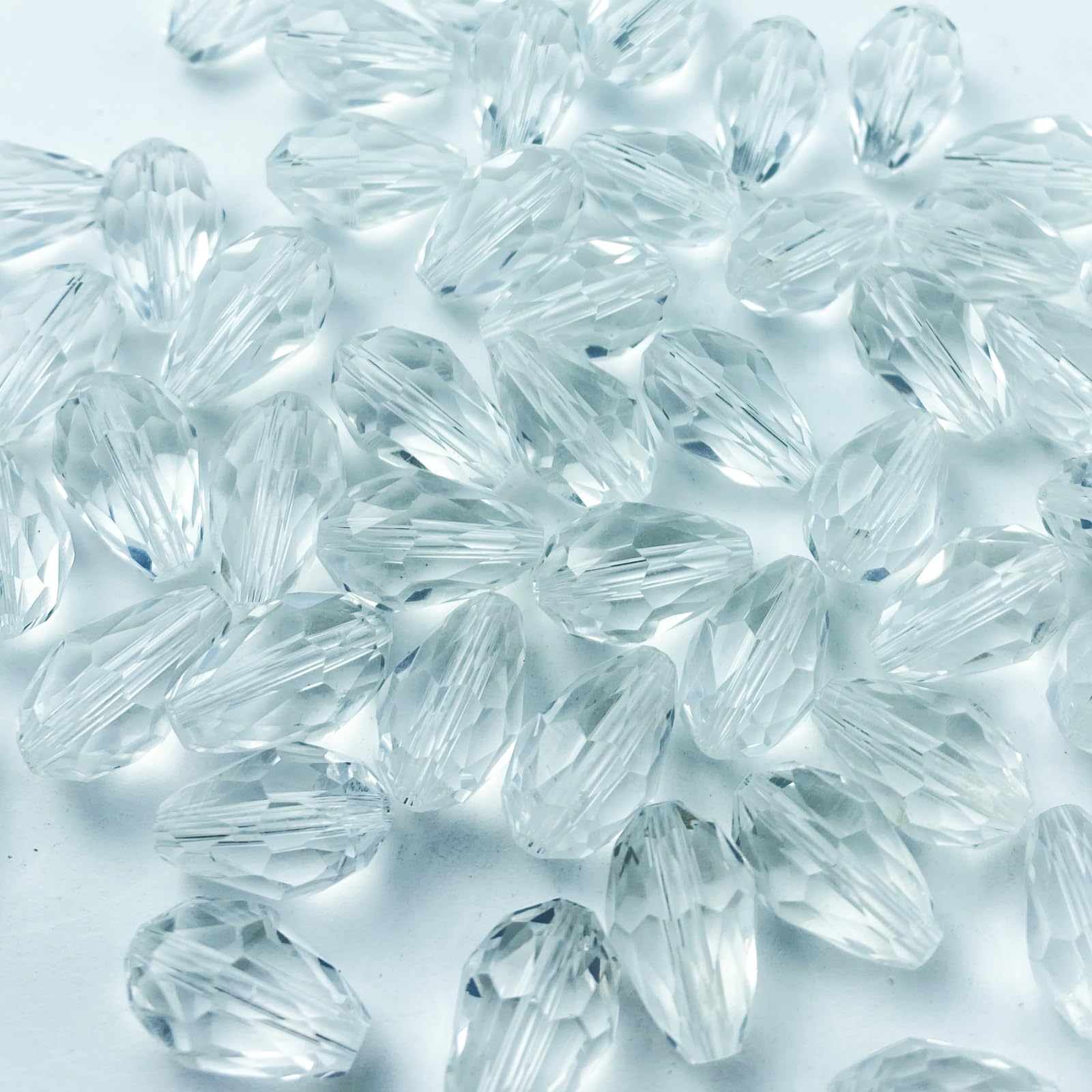 Photo 1 of Honkoolly 50pcs 10x15mm Teardrop Crystal Glass Beads Vertical Hole Faceted Glass Teardrop Spacer Beads for Bracelets Necklace Earring DIY Jewelry Making Craft(Transparent)