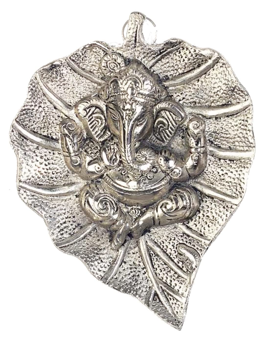 Purpledip white metal wall hanging of Ganpati on leaf (10187)