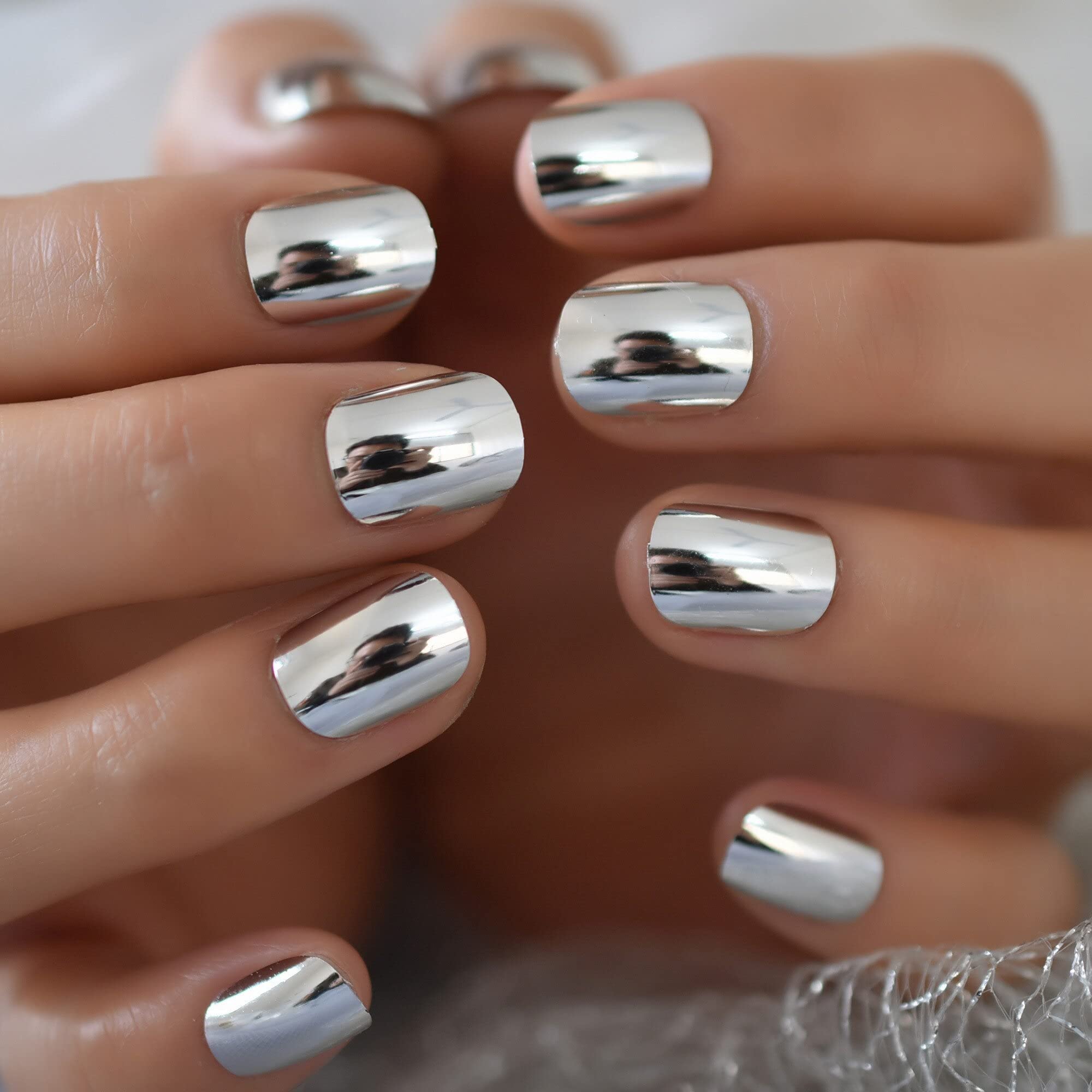 Photo 1 of * missing a lot of them *
Coolnail 24pcs Short Round Mirror Fake Nails Metallic Silver Full Cover Professional Fingernail Round Adult False Nails