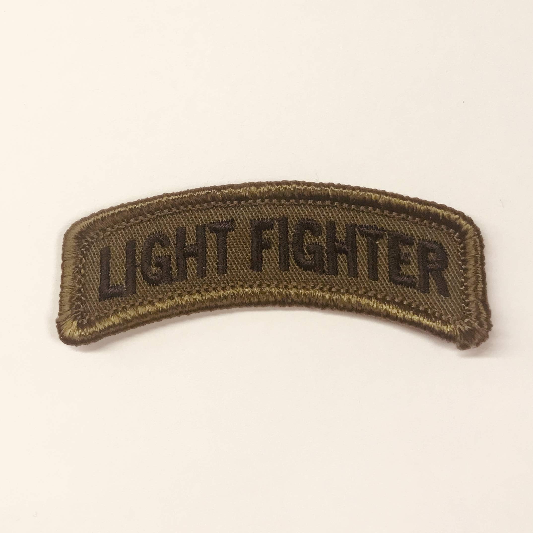 Bayonet Design LIGHTFIGHTER TAB - OD - 2 1/2" X 1" 7th Infantry Division Wax Backed Embroidered tab - Bayonet Division - Hourglass Division - Lightfighter Division - Light Infantry Division